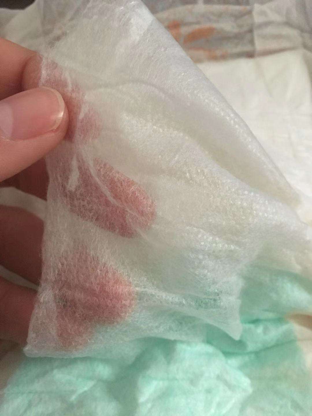 Tela no tejida hilada de polipropileno SSS para pañales para bebés, pañales para adultos, materias primas para servilletas sanitarias